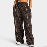 Pantalon de jogging large personnalisé avec étiquette imprimée et passepoil léopard noir, en coton respirant pour femme