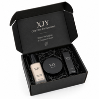 Boîtes d'expédition en carton ondulé noir écologiques personnalisées XJY avec gaufrage et logo pour l'emballage de produits de beauté et cosmétiques