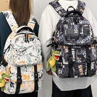 Sac à dos tendance en cuir synthétique microfibre imprimé style graffiti, grande capacité, fermeture éclair, bretelles incurvées
