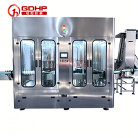 Machine de remplissage entièrement automatique de haute précision, personnalisée par le fabricant, pour la ligne d'embouteillage sous vide de la sauce soja et des liqueurs