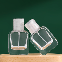 Flacon vaporisateur de parfum à base épaisse personnalisé Offre Spéciale 30ml 50ml flacon de parfum en verre vide transparent lourd avec pompe de pulvérisation