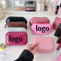 Sac de rangement cosmétique en silicone étanche et écologique, personnalisable avec logo, idéal pour les voyages, les cadeaux promotionnels et les cadeaux d'affaires.
