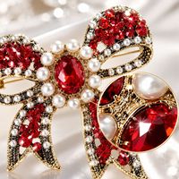 Nouvelle broche nœud papillon rétro en alliage, style européen et américain, avec perles et strass – Épingle de corsage unisexe exquise et polyvalente