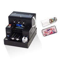 Stampante UV A4 della penna delle casse del telefono cellulare della bottiglia della macchina da stampa digitale uv automatica a4 LED per la stampante a base piatta UV epson L805