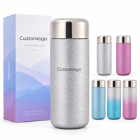 Bouteilles d'eau portables réutilisables en titane à double paroi isolées sous vide de 10 oz avec infuseur à thé, personnalisées et de luxe, pour le voyage