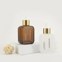 Flacon rectangulaire givré de nouveau style bouteille en verre blanc ambre emballage cosmétique personnalisé de 30ml avec bouchon compte-gouttes pour sérum d'huile capillaire