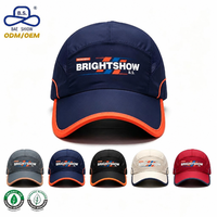 Casquette de course à séchage rapide personnalisée Brightshow avec logo imprimé, bord incurvé bleu marine et orange, maille respirante pour les sports de plein air