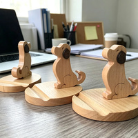 Support de téléphone portable en bois de hêtre massif naturel, bicolore, en forme de chiot mignon, pour la décoration de la maison et du bureau, vente en gros sur mesure