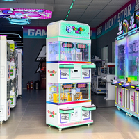 Machine à griffes commerciale 4 joueurs avec accepteur de pièces, jeu de défi de 10 secondes, jeu de tapotement à temps limité, verre trempé, prise en charge de l'anglais, OEM ODM