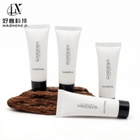 Kit de toilette pour hôtel en tube miniature de 30 ml, parfum gardénia, shampoing et gel douche pour les chambres d'hôtel