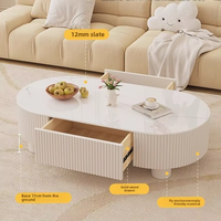 Table basse ovale moderne simple en ardoise crème pour petite maison ou appartement rangement pour thé et salon