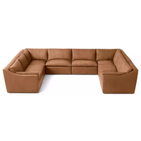 Canapé de salon moderne de luxe en cuir, modulaire, avec accoudoirs inclinables, coussins moelleux et doux, éco-responsable, personnalisable pour villa et appartement