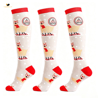 Vente directe d'usine, chaussettes de compression de Noël, OEM ODM, design personnalisé du Père Noël, chaussettes longues jusqu'au genou, adulte et enfant