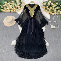 Robe longue décontractée pour femme, style bohème, en dentelle, col en V, avec franges, ceinture à nouer, idéale pour les vacances à la plage ou le quotidien