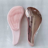 Brosse à cheveux démêlante en nylon à manche magique or rose de luxe de marque privée pour cheveux bouclés