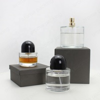 Flacon pulvérisateur unique à fond épais, flacon de parfum rond 30ml 50ml 100ml, flacon de parfum en verre de forme ronde en pierre volcanique