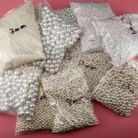 Perles d'eau douce naturelles et coquilles d'huîtres géantes - Couleurs assorties, emballées sous vide, vente en gros pour cadeaux