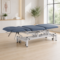 Table de massage électrique réglable en hauteur à 5 sections avec appui-tête intégré, structure moderne en PVC durable, rembourrage en mousse haute densité