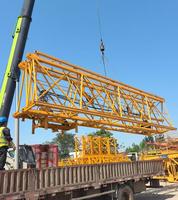 Grue à tour de construction Zoomlion 7527 d'occasion en bon état, 16 tonnes, flèche de 75 m pour bâtiments de grande hauteur
