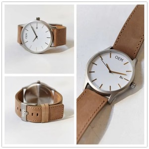 Montre à quartz classique et simple pour homme avec fonction calendrier, aiguille des secondes rouge, bracelet en cuir marron, style décontracté et professionnel, vente en gros - Product Image 5