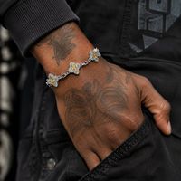 Bracelet trèfle à quatre feuilles incrusté de zircone cubique colorée brillante, en cuivre, style hip-hop urbain, faible MOQ, vente en gros