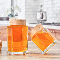 Prix de gros Bocal en verre hexagonal transparent haut de gamme de qualité alimentaire Bocaux en verre hexagonal de 180ml avec couvercles
