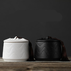 Mountain Shape Lid Matte Ceramic Tea Canister with Embossed Wave Pattern and Tassel Decor Airtight Zen Style Storage Jar - Product Image 3