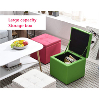 Tabouret multifonctionnel pour le salon, rangement en cube, pouf, siège, pouf, tabouret avec espace de rangement caché.
