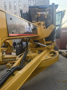 Niveleuse Caterpillar 140K d'occasion de Shanghai avec composants PLC et boîte de vitesses essentiels - Product Image 3