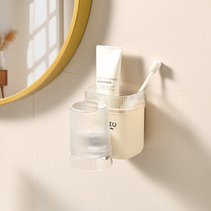 Porte-brosse à dents mural couleur crème, sans perçage, pour usage domestique dans les salles de bain et les toilettes. Approvisionnement direct d'usine. - Product Image 2