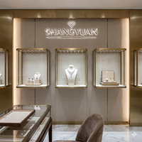 Vitrine à bijoux de luxe en or champagne, présentoir mural flottant en métal et verre, vitrine sur mesure pour diamants pour Hig...