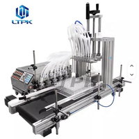 Machine automatique à pompe péristaltique à 10 têtes pour le remplissage de liquides (ampoules, sérums, parfums, flacons oraux, boissons, huiles, lait en sachets)