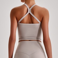 Soutien-gorge de sport pour femme, haute élasticité, respirant, maintien élevé, effet seconde peau, bretelles croisées, bonnets rembourrés, pour le yoga et le fitness