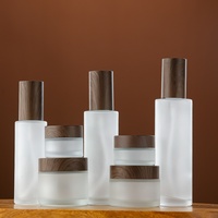Flacon distributeur d'huile essentielle en bois grainé givré, flacon de lotion à fond épaissi, flacon de lotion cosmétique en verre à fond en bois