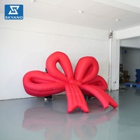 Modèle gonflable géant personnalisé en forme de nœud rouge suspendu pour les festivals, les fêtes, les vitrines de magasins, la publicité en extérieur, décoration gonflable