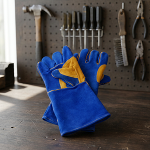 Guantes de soldadura de cuero azul con refuerzo amarillo en la palma, 14 pulgadas de largo, forrados de algodón, para soldadura con electrodo. - Product Image 4