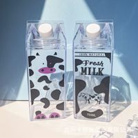 Bouteille d'eau carrée transparente de grande capacité de 750 ml (25 oz), boîte d'emballage de jus réutilisable et rotative