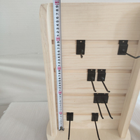 Présentoir rotatif double face en bois pour panneau perforé avec crochets pour l'affichage de marchandises