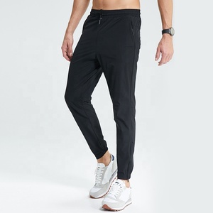 <span class=keywords><strong>Pantaloni</strong></span> sportivi <span class=keywords><strong>idrorepellenti</strong></span> da uomo con cerniera - Product Image 1