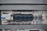 Máquina CNC de Nesting de 1300x2500mm con Husillo Refrigerado por Aire ATC de 9KW, Sierra de Giro Automática, Mesa de Vacío y Reductor Japonés para Madera
