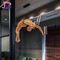 Projet à grande échelle personnalisé longue suspension LED diverses sculptures uniques en acier inoxydable décoration de villa de hall d'hôtel