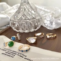 Bague émeraude de luxe haut de gamme pour femme Design de niche de style froid avec queue réglable plaqué or ouverture à la mode européenne américaine