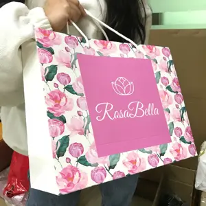 Venta al por mayor logotipo impreso personalizado de lujo blanco al por menor Boutique de compras joyería regalo bolsas de papel con su propio logotipo