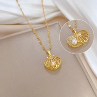Exquis français creux coquille perle collier lumière luxe personnalité haut de gamme rétro mode polyvalent pendentif