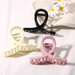 Pince à cheveux en plastique brillant de 11 cm, design croisé, simple et tendance, pour femmes, idéale pour les bals et l'usage quotidien - Product Image 1