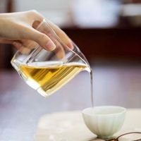 Tasse à thé en verre transparente en borosilicate épais avec poignée uniforme, style chinois, portable, résistante aux hautes températures pour le thé Kung Fu