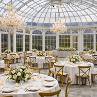 Orangerie en fer forgé de style victorien avec verrière, grand pavillon extérieur pour mariages, serre