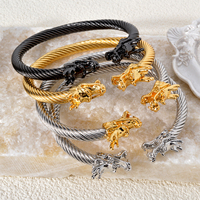 Bijoux tendance Bracelet torsadé ouvert en acier inoxydable plaqué or 18 carats avec manchette Dragon pour femmes