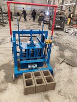 Machine mobile économique à 3 trous pour la fabrication de blocs de béton, de pavés creux en ciment et de briques autobloquantes