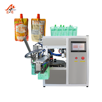 Machine de remplissage semi-automatique de jus liquide pur en sachet à bec verseur, sachet doypack, machine de remplissage et de bouchage de lotion de 1 litre